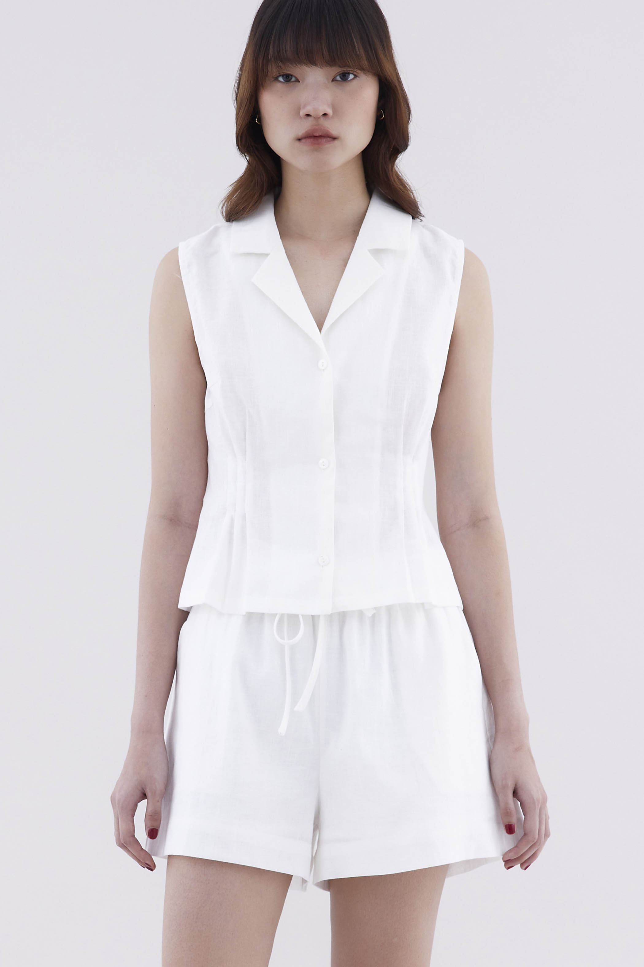 Corene Fluted Sleeveless Shirt