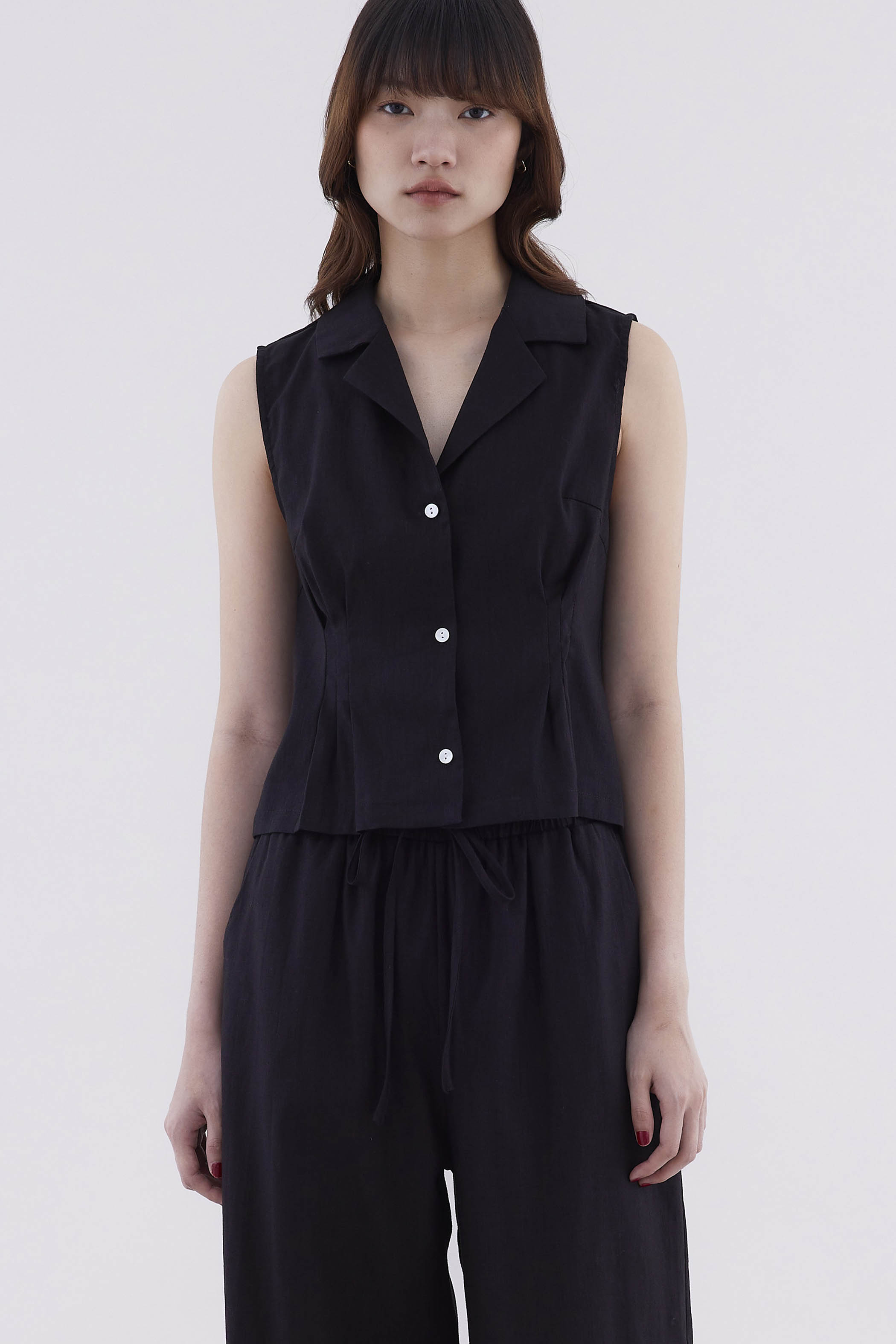 Corene Fluted Sleeveless Shirt